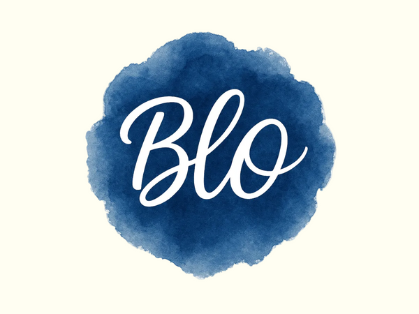 Blue watercolor splash with 'Blo' text on a white background
