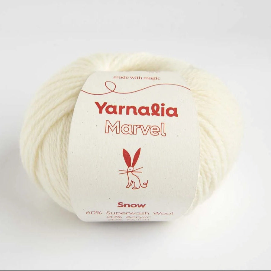 Ball of yarn with 'Yarnalia Marvel' label on a white background