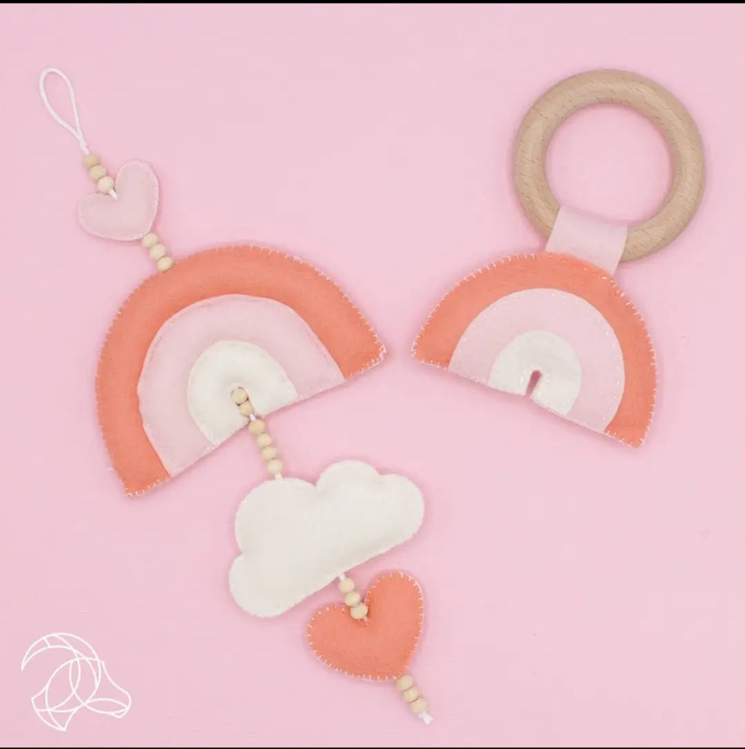 Nursery Decor with rainbow, cloud, and heart designs Pink baby gift.