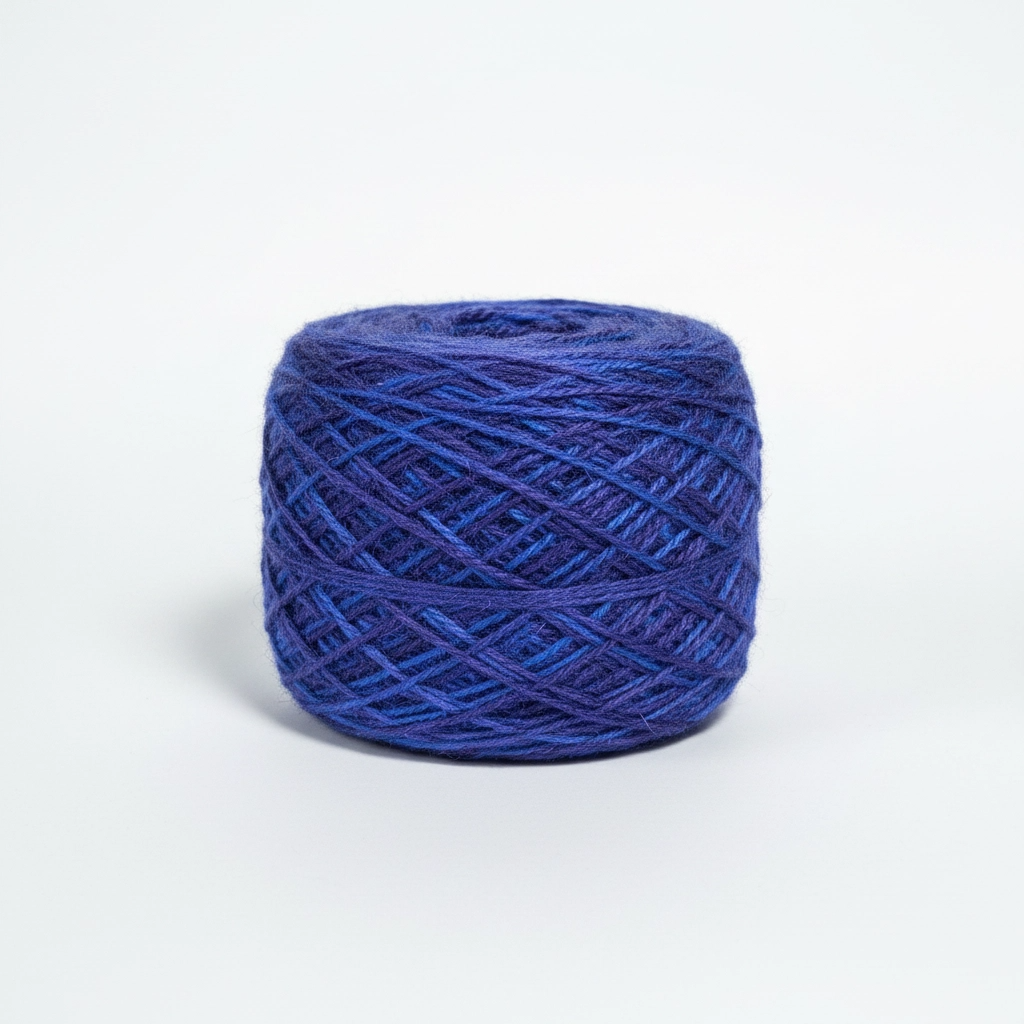 Blue skein of yarn on a white background