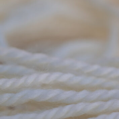 Close-up of a ball of white yarn