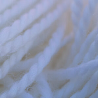 Close-up of white yarn strands