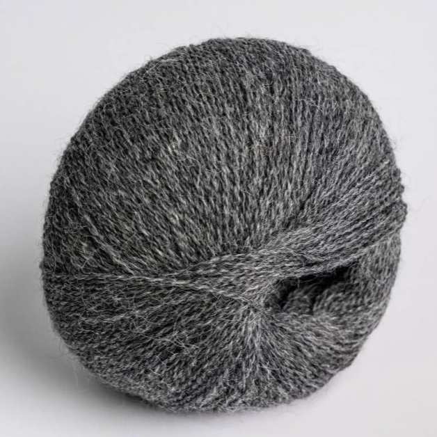 Gray skein of yarn on a white background