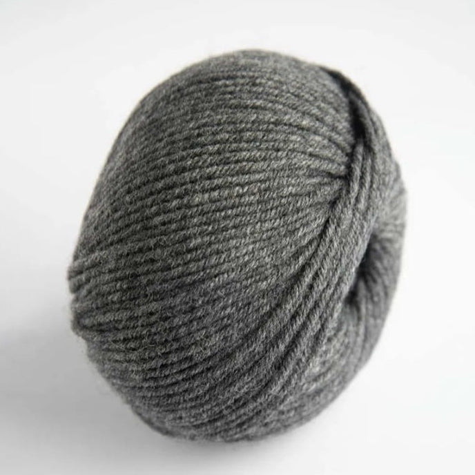 Gray knitted beanie on a white background