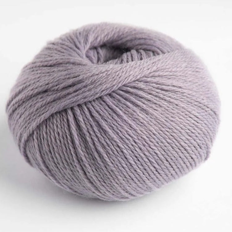 Ball of gray yarn on a white background