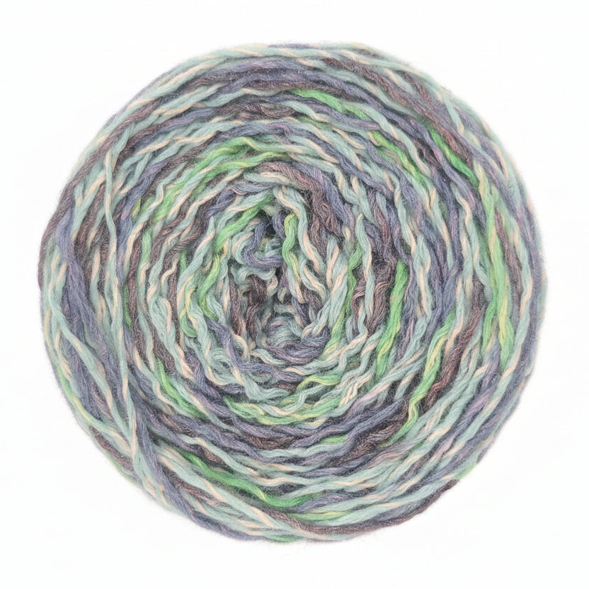 Multicolored yarn ball on a dark background