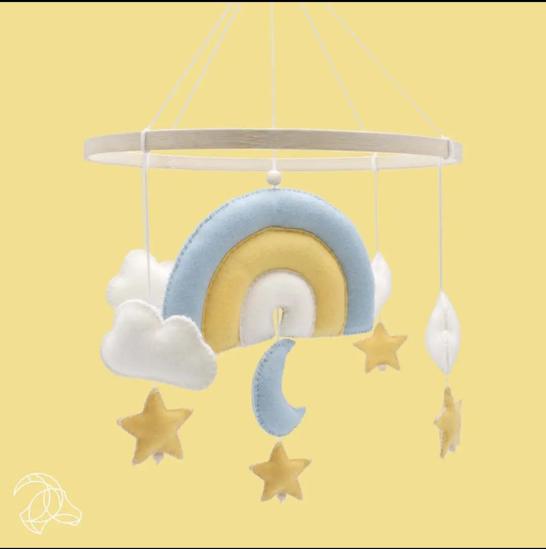 Nursery decor mobile with rainbow, clouds, and stars, intermediate diy sewing kit, felt.
