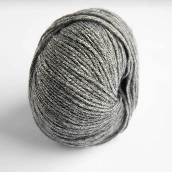 Gray skein of yarn on a white background