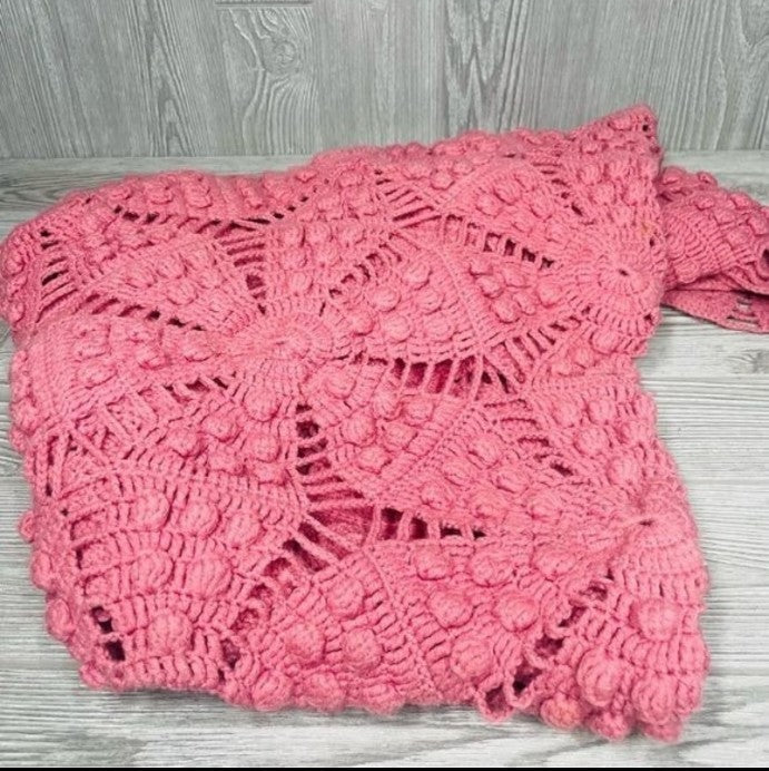 Pink crochet vintage lace with raised textured diamond stitching